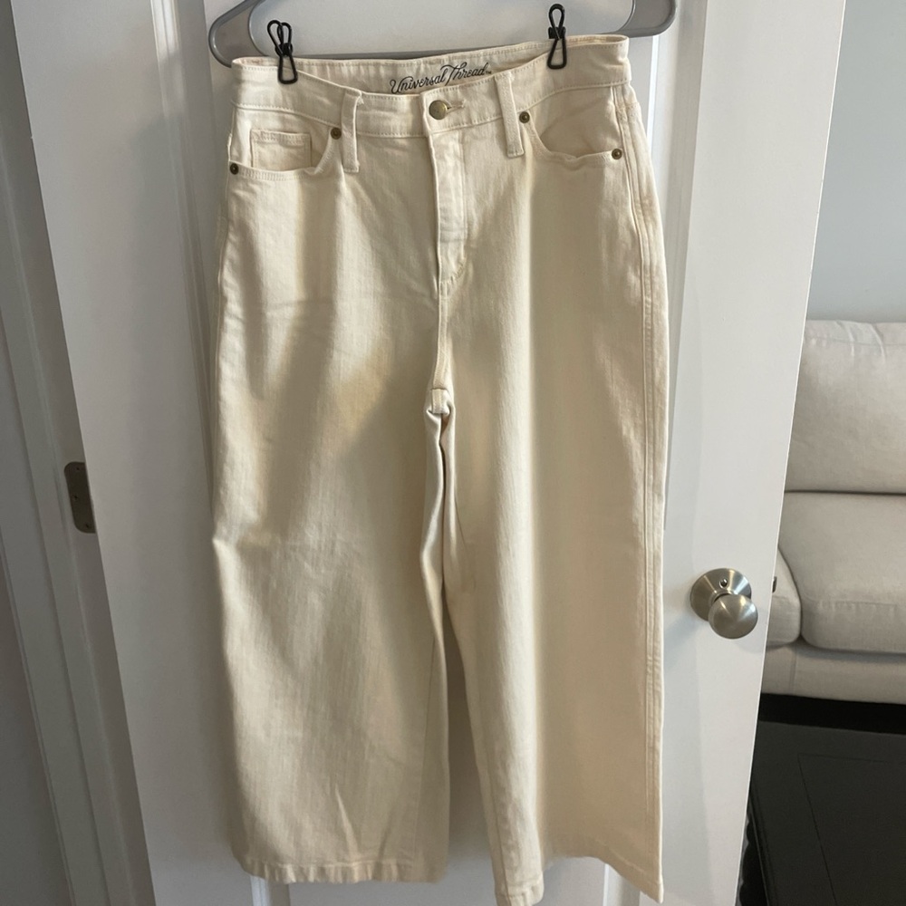 Cream colored flare crop jeans